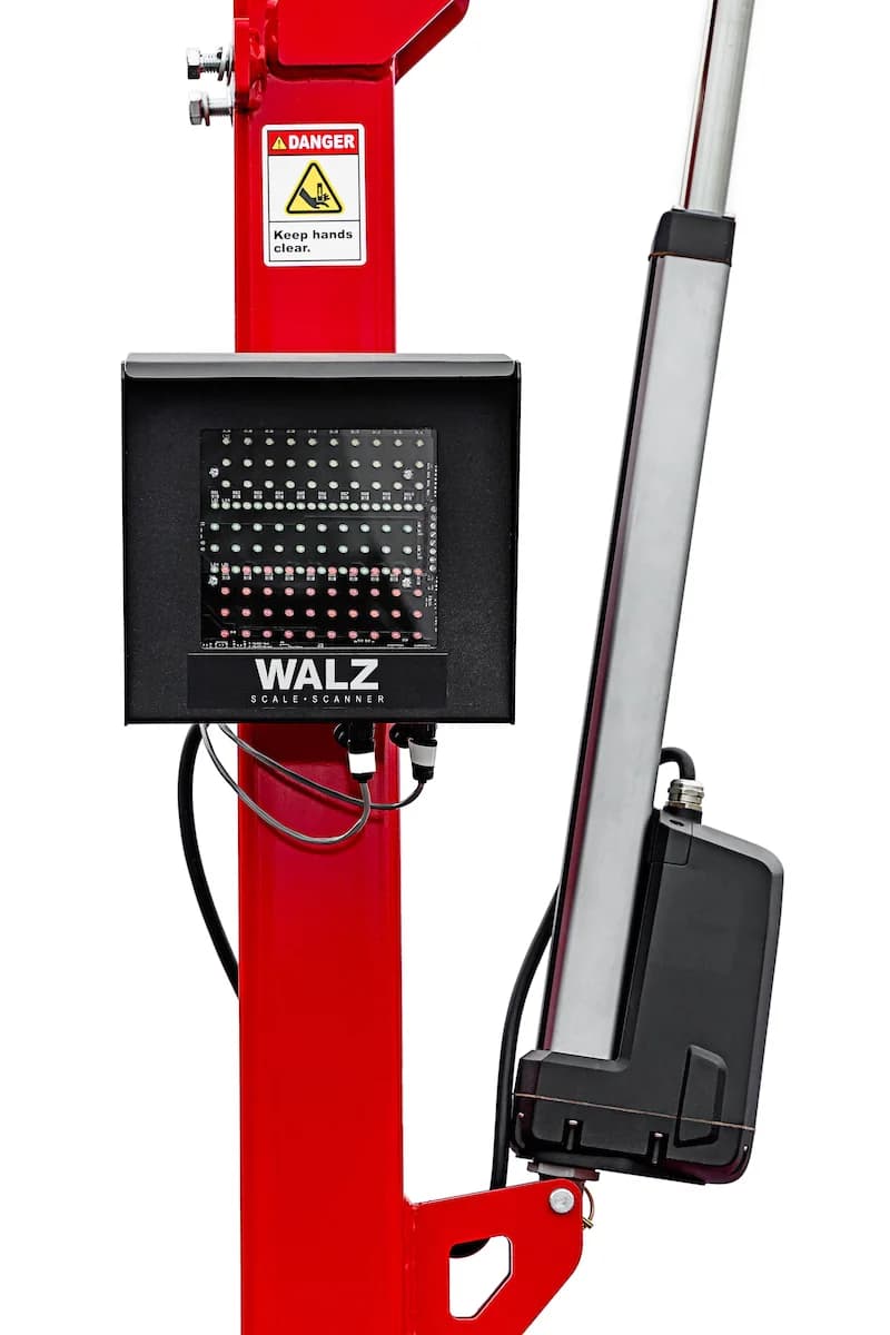 Stop-go light and actuator accessory for a WLS scanner lane.