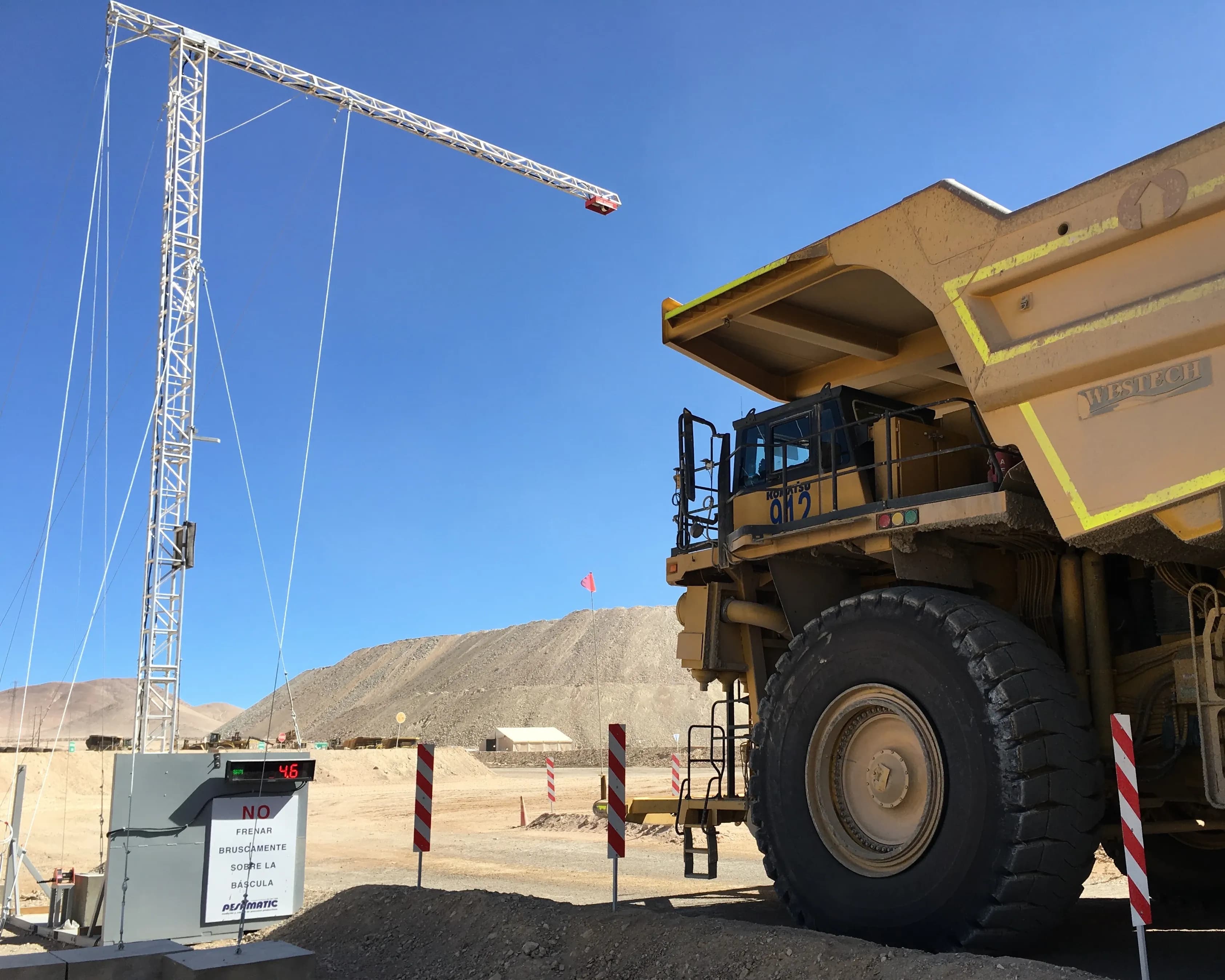 Mining haul truck about to scan a payload with a permanent-mounted Walz Scale WLS-M2 off road volumetric payload scanner.