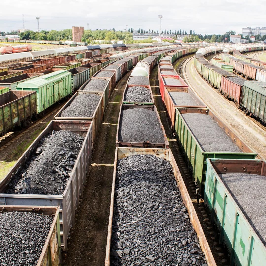 aerial view of rail cars on track