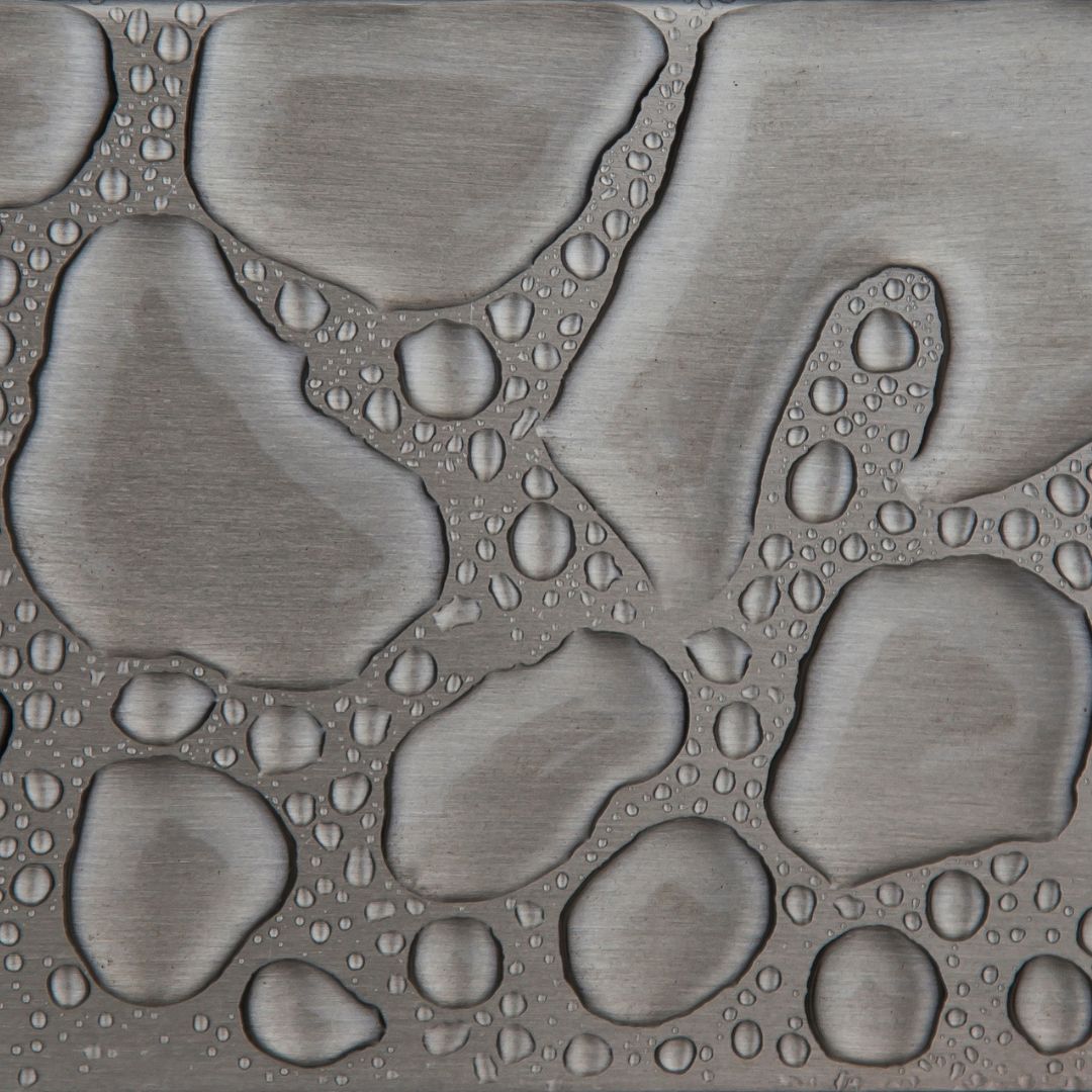 photo of water drops on metal